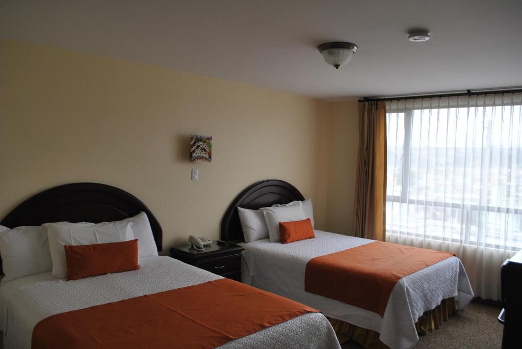 Postel nebo postele na pokoji v ubytování MAK INN HOUSE