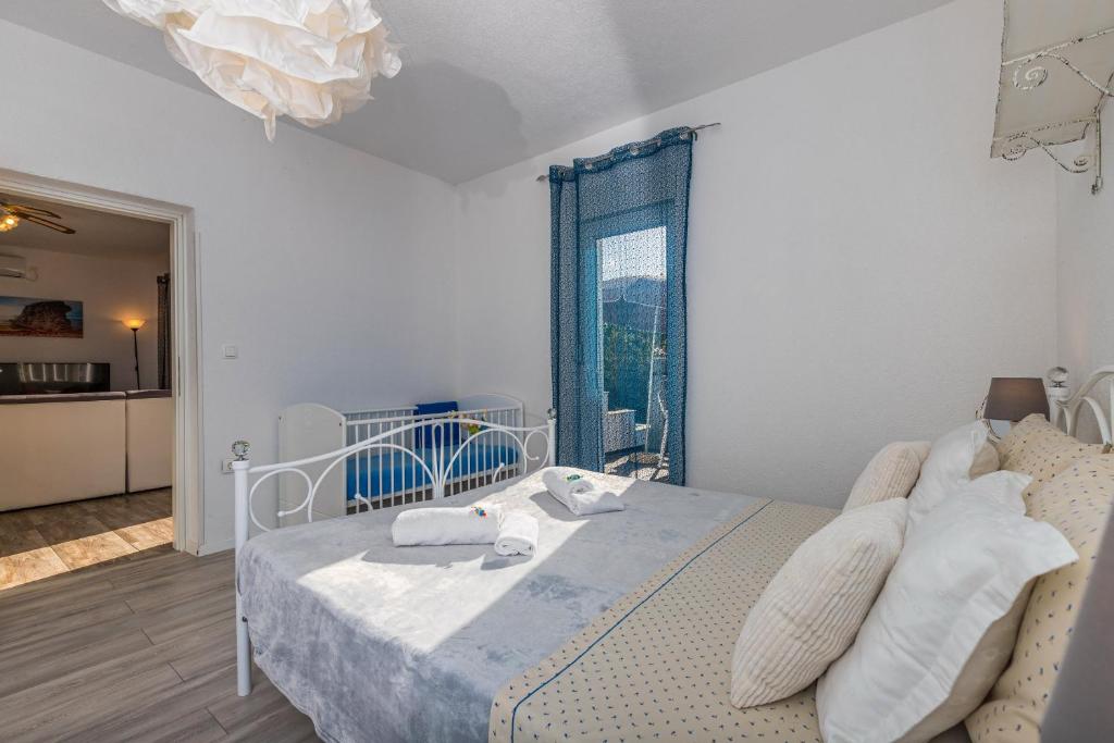 Posteľ alebo postele v izbe v ubytovaní Villa Manta Crikvenica