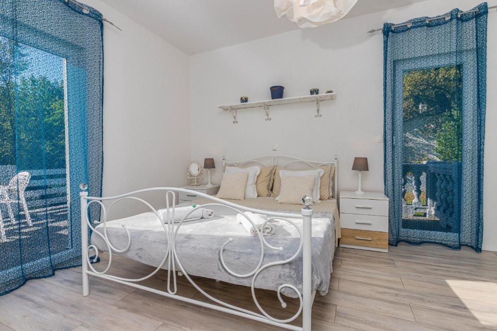 Posteľ alebo postele v izbe v ubytovaní Villa Manta Crikvenica