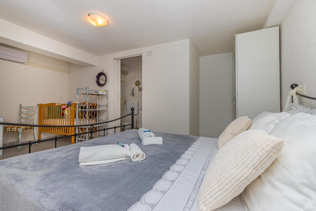 Posteľ alebo postele v izbe v ubytovaní Villa Manta Crikvenica