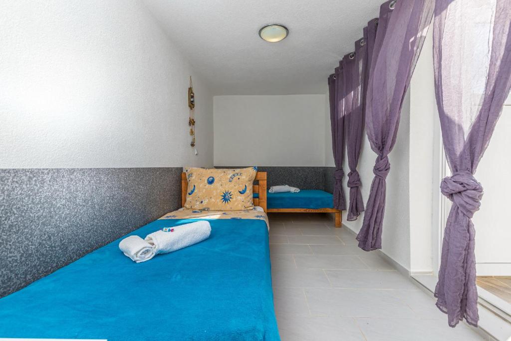 Posteľ alebo postele v izbe v ubytovaní Villa Manta Crikvenica