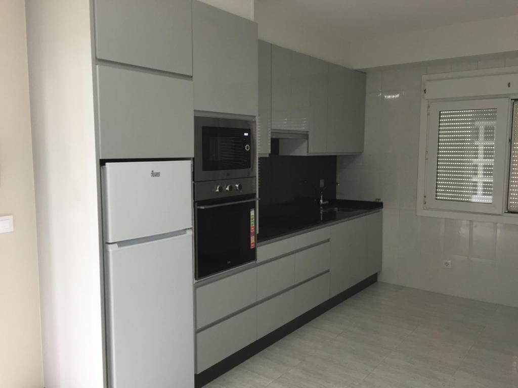 Kuchyňa alebo kuchynka v ubytovaní Apartamentos Susa