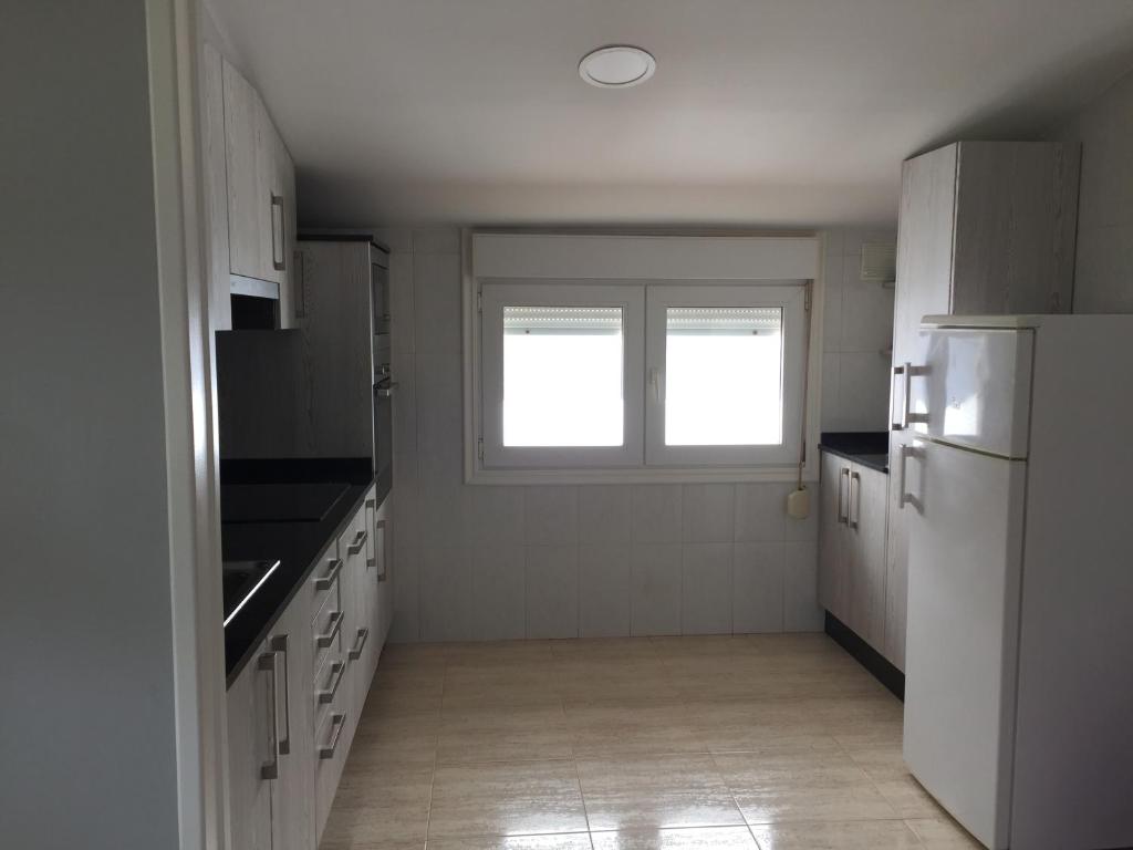 Kuchyňa alebo kuchynka v ubytovaní Apartamentos Susa