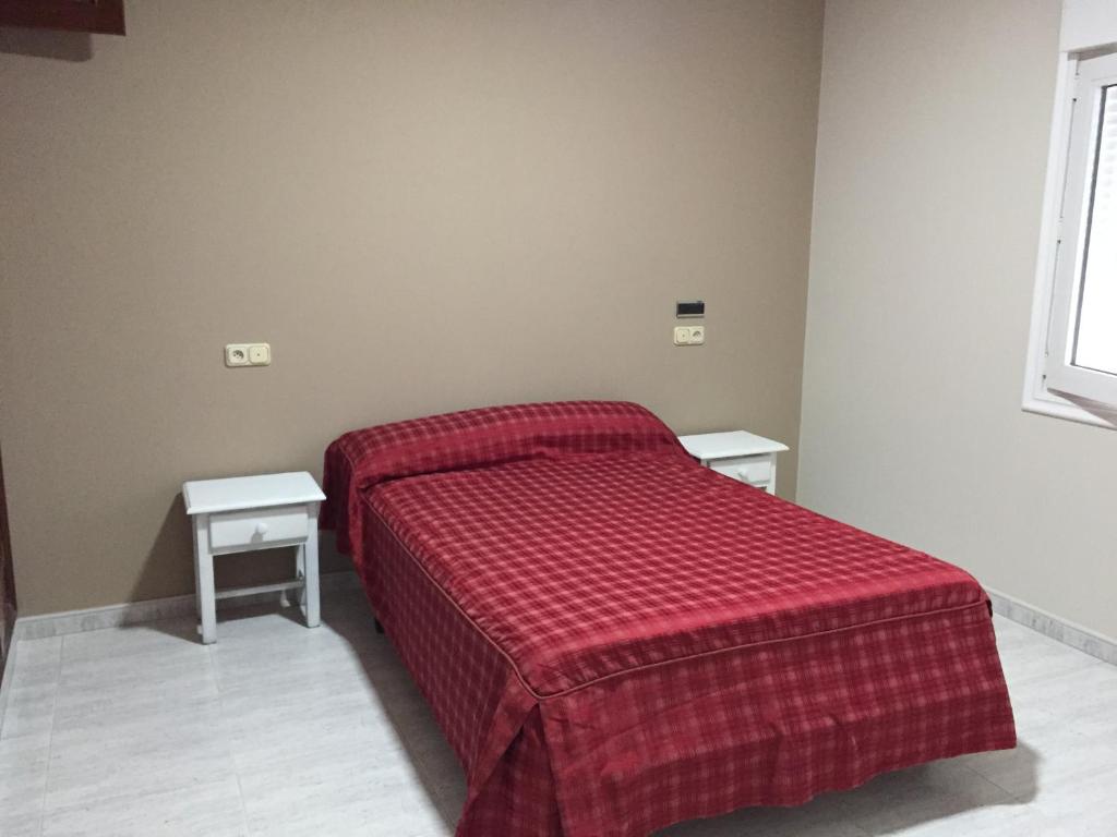 Posteľ alebo postele v izbe v ubytovaní Apartamentos Susa