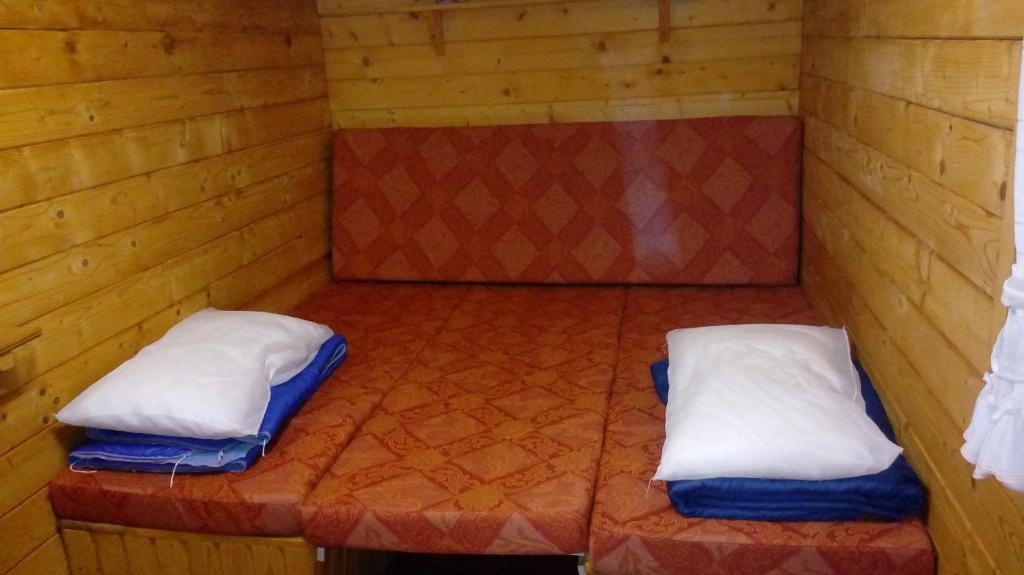 Voodi või voodid majutusasutuse Camping Yoghi e Bubu toas