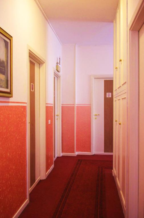 Postel nebo postele na pokoji v ubytování Hotel Rosy
