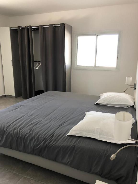 Postel nebo postele na pokoji v ubytování B. O. PARADIS SXM