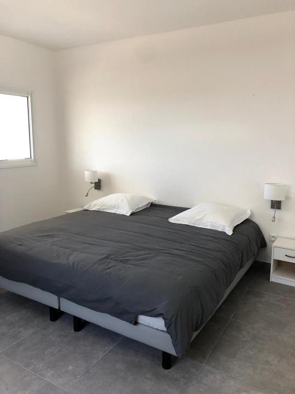 Postel nebo postele na pokoji v ubytování B. O. PARADIS SXM