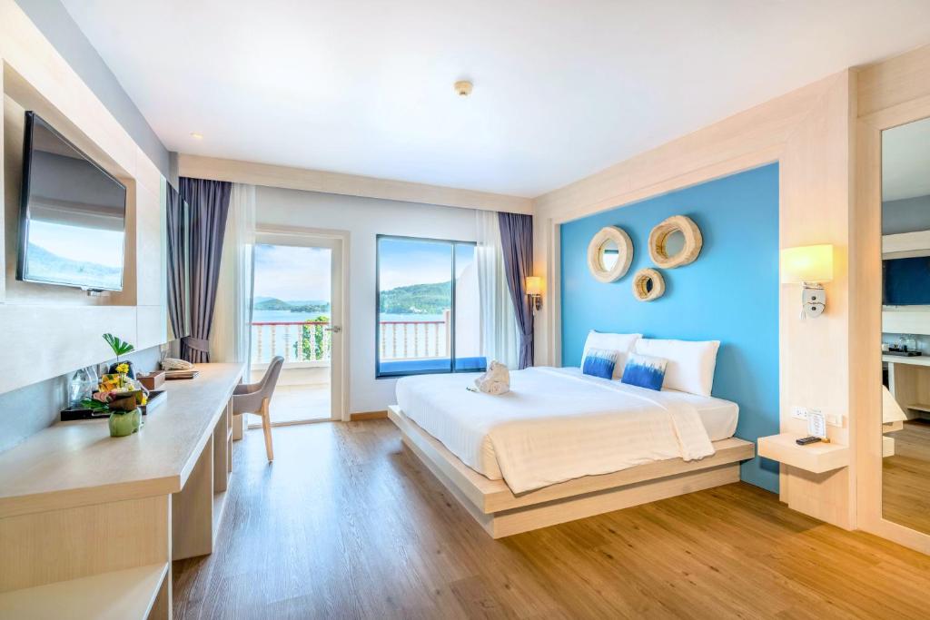 Postel nebo postele na pokoji v ubytování Namaka Resort Kamala