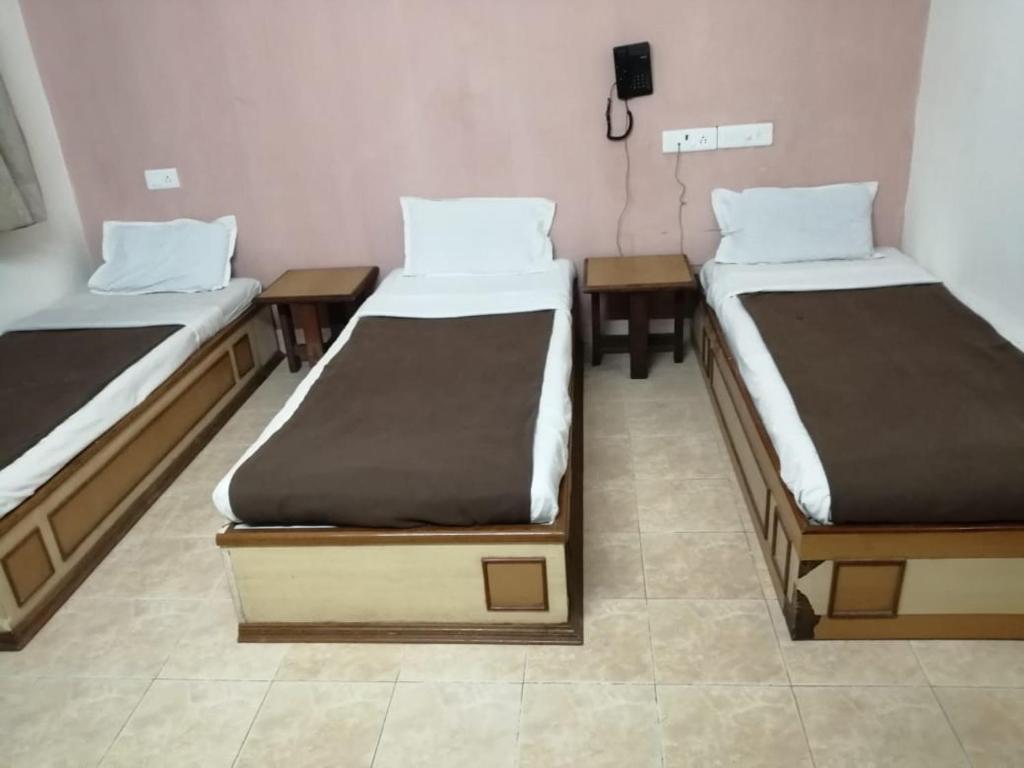 Postel nebo postele na pokoji v ubytování Hotel Damjis