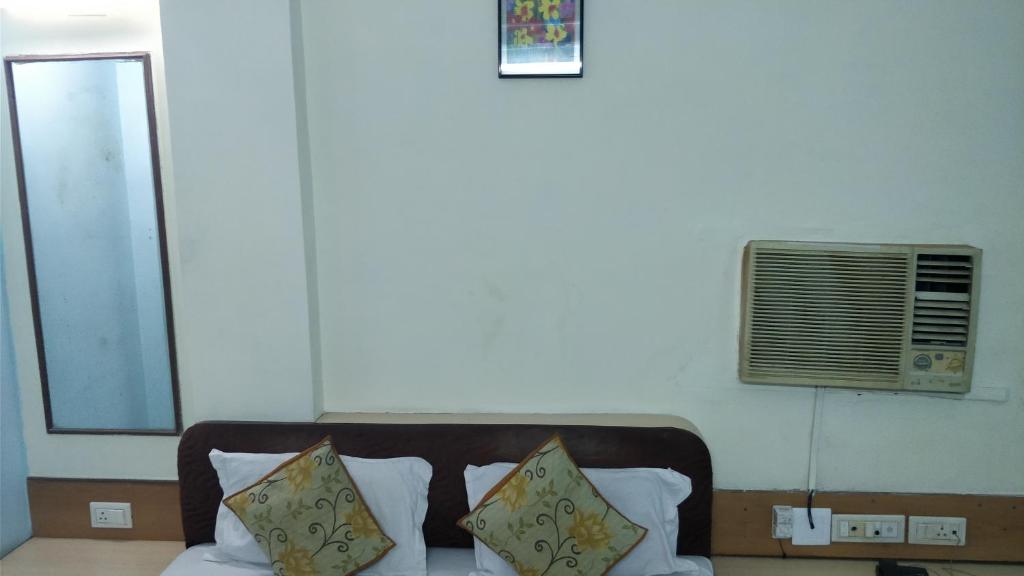 Postel nebo postele na pokoji v ubytování Hotel Damjis