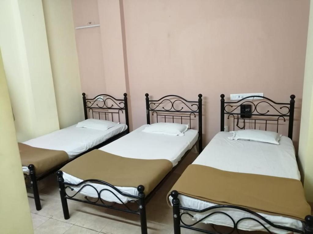 Postel nebo postele na pokoji v ubytování Hotel Damjis