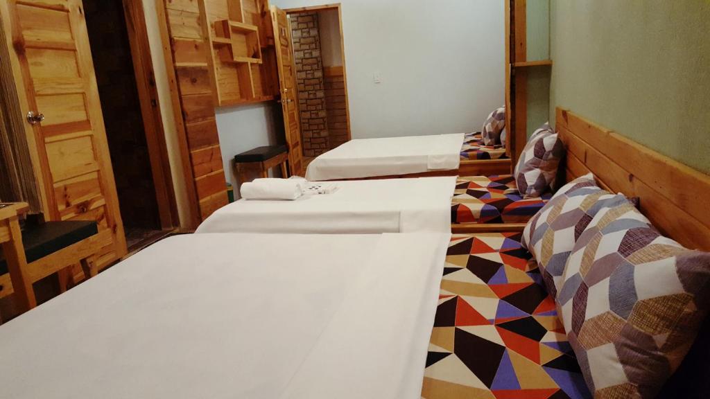 Katil atau katil-katil dalam bilik di Sagada Lodging Home