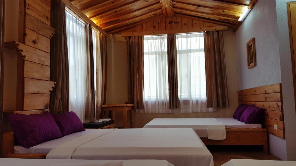 Katil atau katil-katil dalam bilik di Sagada Lodging Home