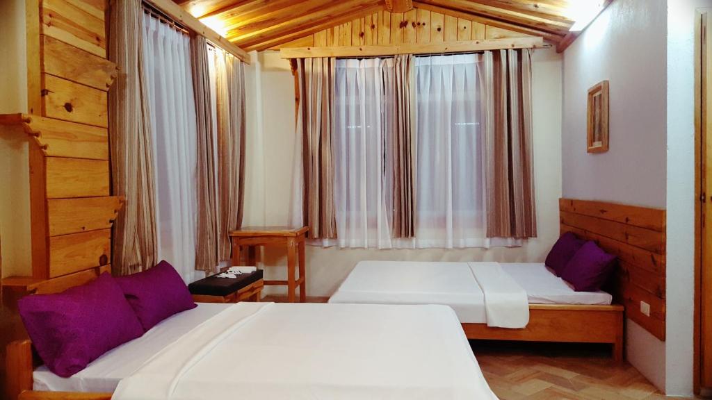 Katil atau katil-katil dalam bilik di Sagada Lodging Home