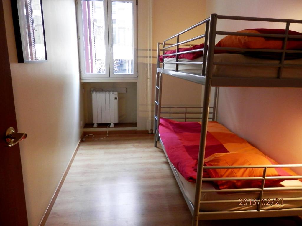Postel nebo postele na pokoji v ubytování Barcelona Central Garden Hostal