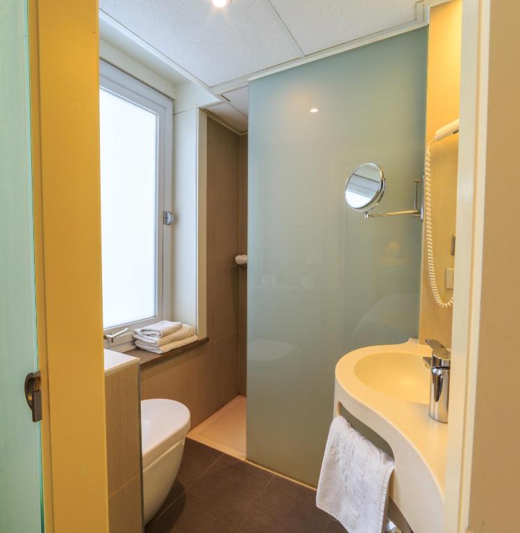 Koupelna v ubytování Hotel Pacific