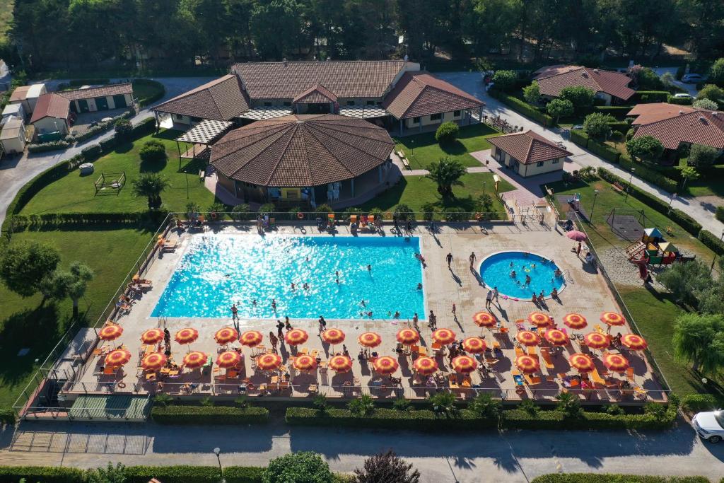 an aerial view of a pool at a resort at Villaggio Mare Verde in Riotorto
