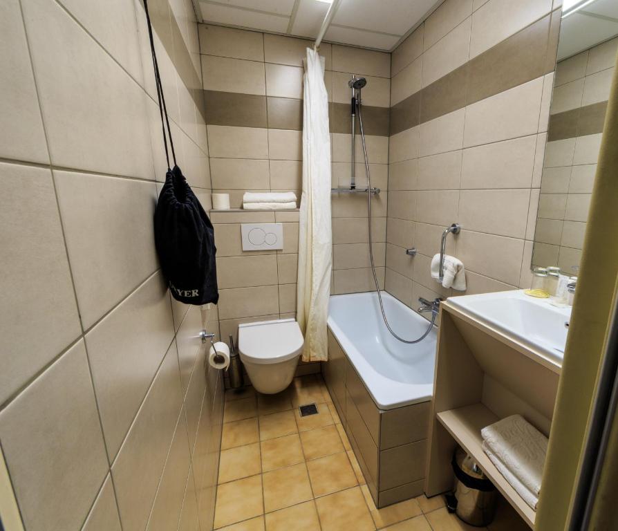 Koupelna v ubytování Hotel Pacific