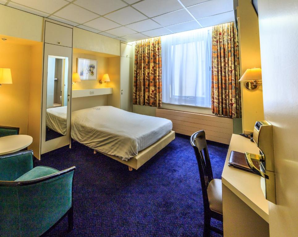 Postel nebo postele na pokoji v ubytování Hotel Pacific