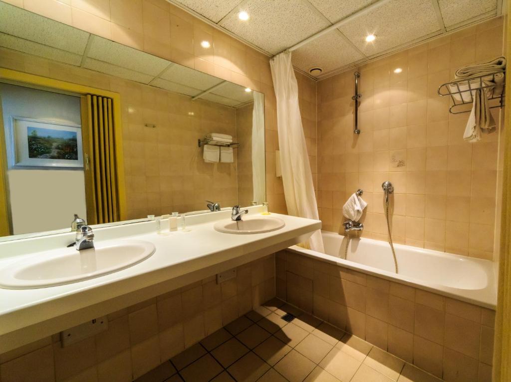 Koupelna v ubytování Hotel Pacific