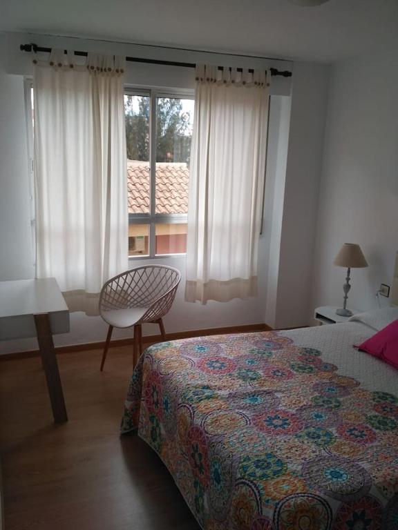 Postel nebo postele na pokoji v ubytování Apartamento Puertoplaya I