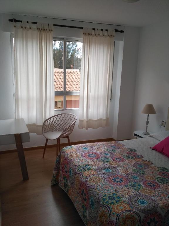 Postel nebo postele na pokoji v ubytování Apartamento Puertoplaya I