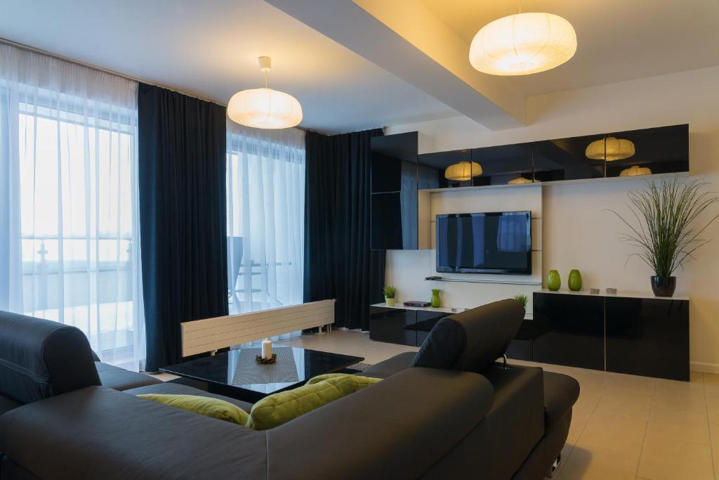 TV a/nebo společenská místnost v ubytování Apartament Na Urlop - Wisła Bukowa Góra - Apartamenty z widokiem na panoramę Wisły