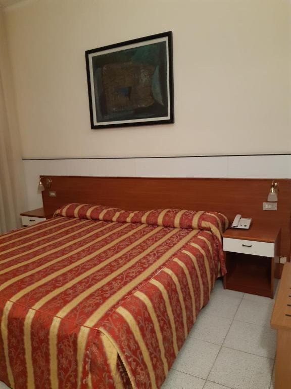 En eller flere senge i et værelse på Hotel Mayorca
