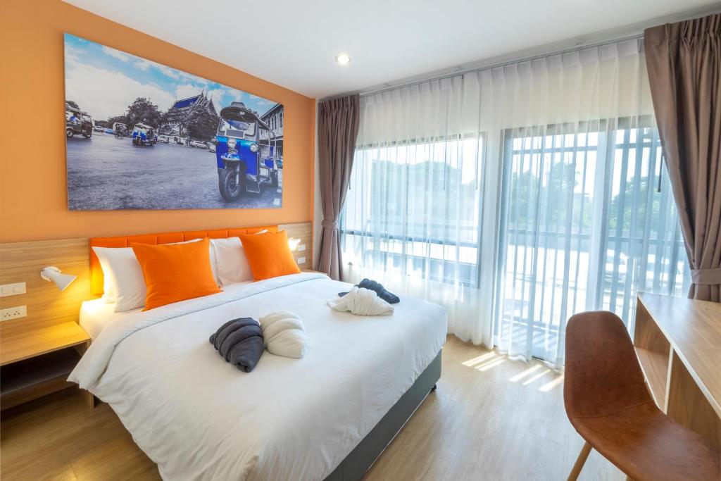Katil atau katil-katil dalam bilik di The Iconic Hotel Don Mueang Airport