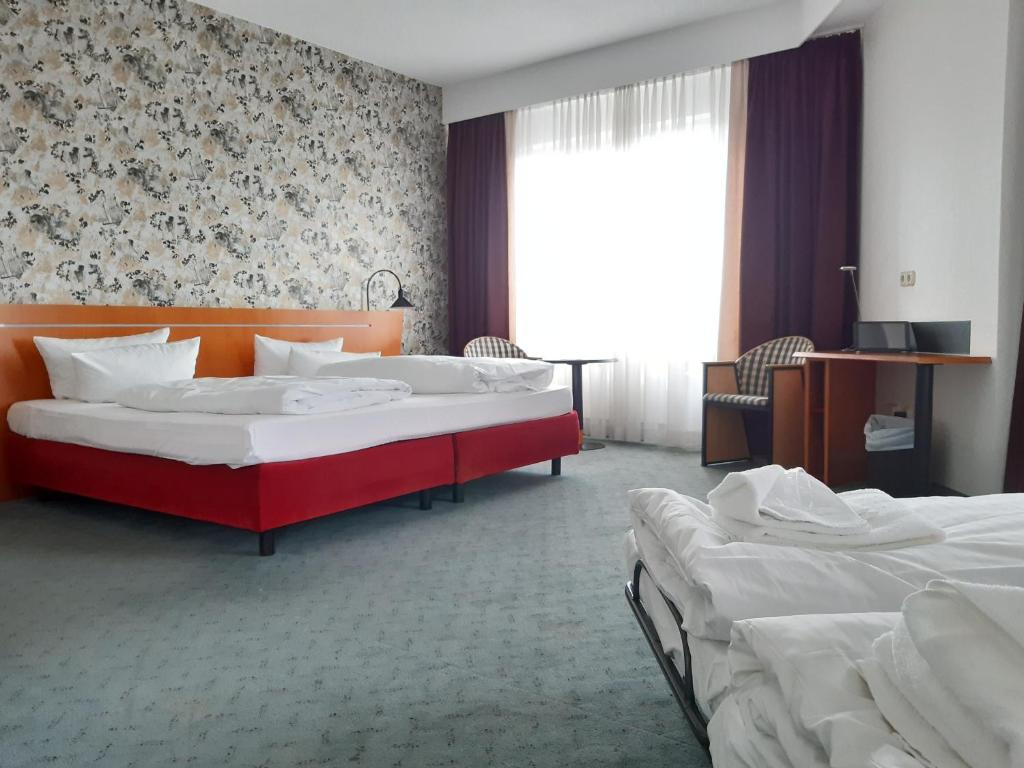 Postel nebo postele na pokoji v ubytování Good Morning + Leipzig