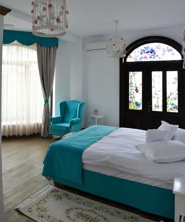 Postel nebo postele na pokoji v ubytování Hotel Coquette