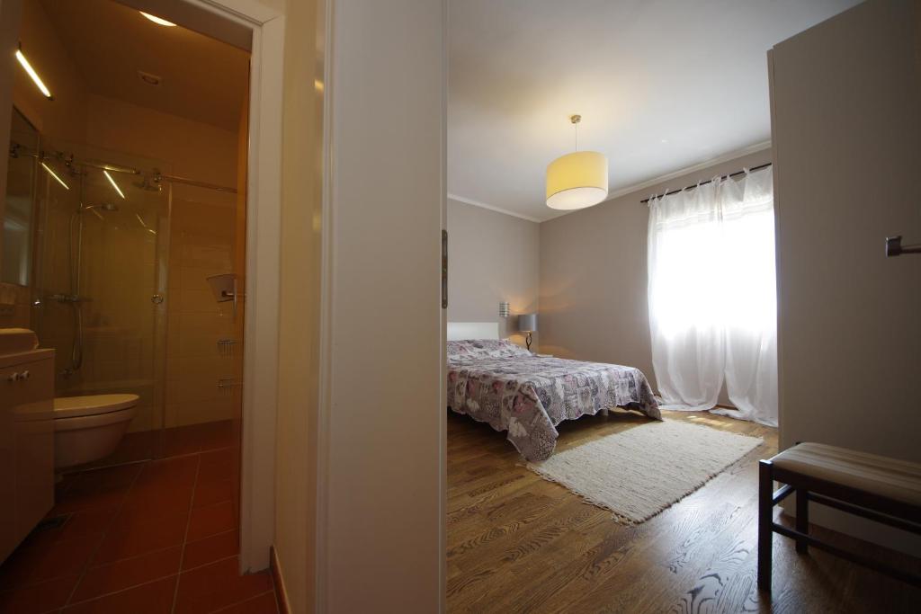 Postel nebo postele na pokoji v ubytování Apartman Marija