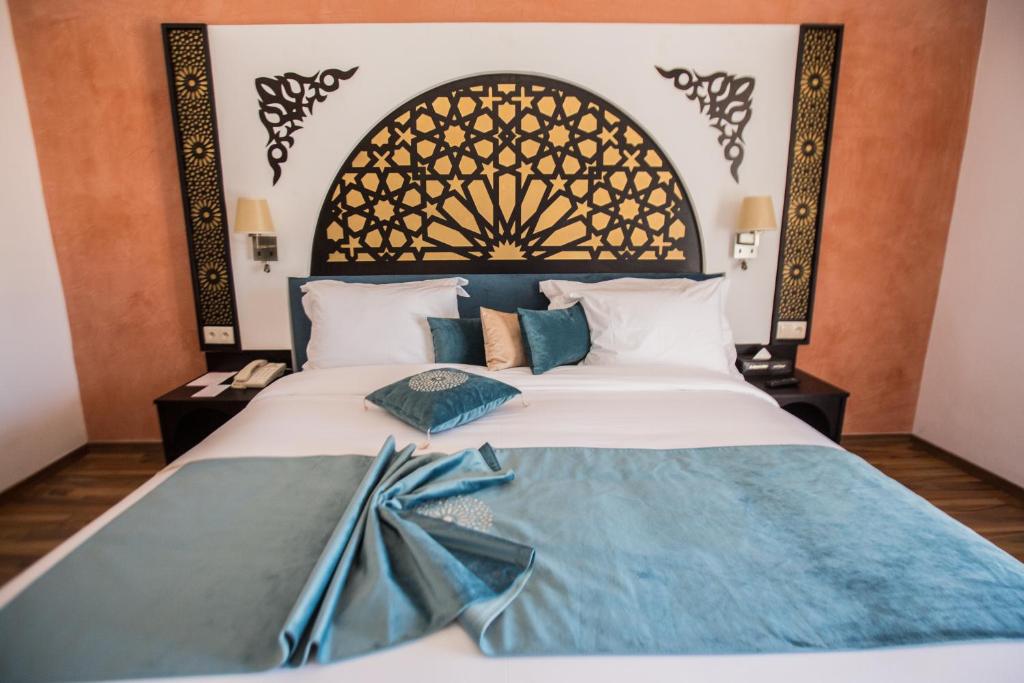Voodi või voodid majutusasutuse El Minzah Hotel toas