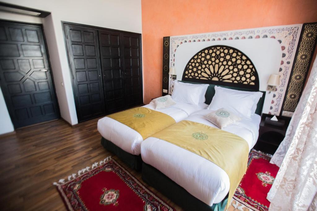 Voodi või voodid majutusasutuse El Minzah Hotel toas
