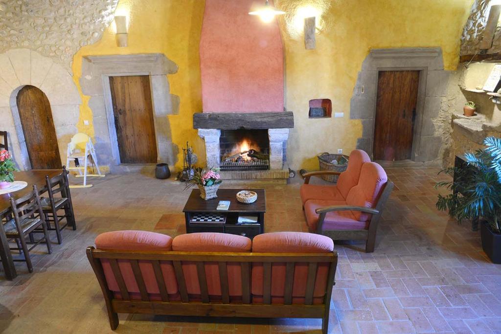 Posezení v ubytování Can Marisch La Casa Pairal