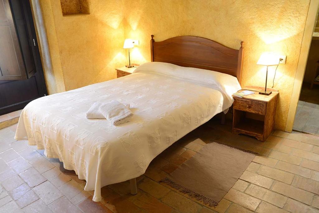 Postel nebo postele na pokoji v ubytování Can Marisch La Casa Pairal