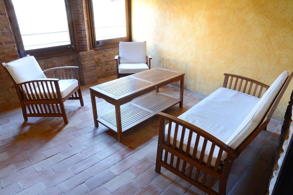 Posezení v ubytování Can Marisch La Casa Pairal
