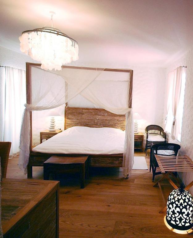 Łóżko lub łóżka w pokoju w obiekcie Boutique Hotel Placa