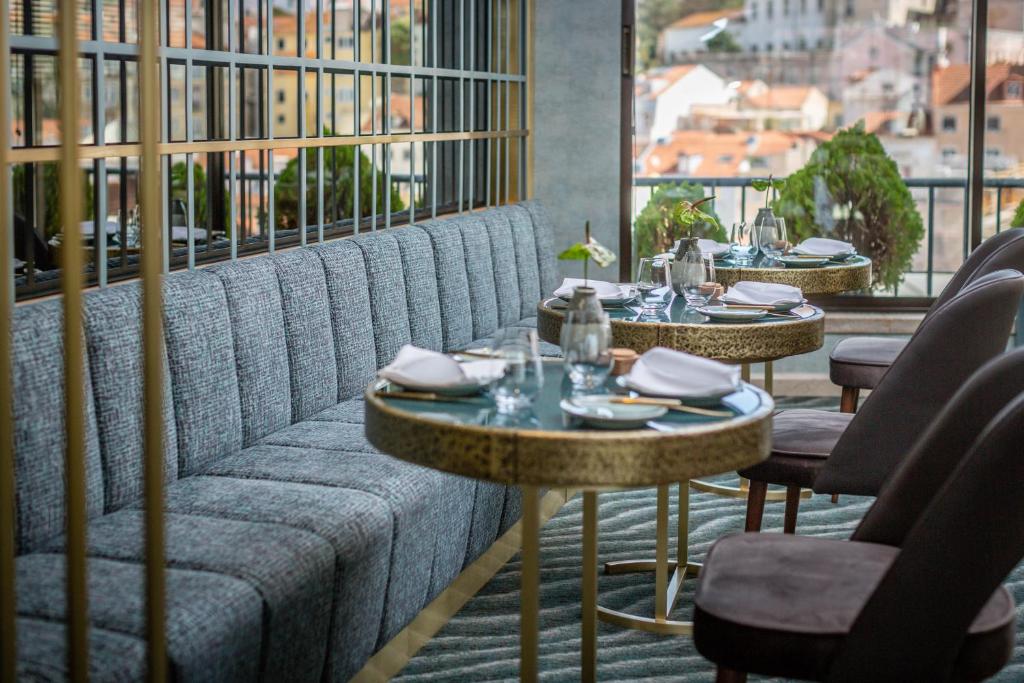 Ein Sitzbereich in der Unterkunft Hotel Mundial