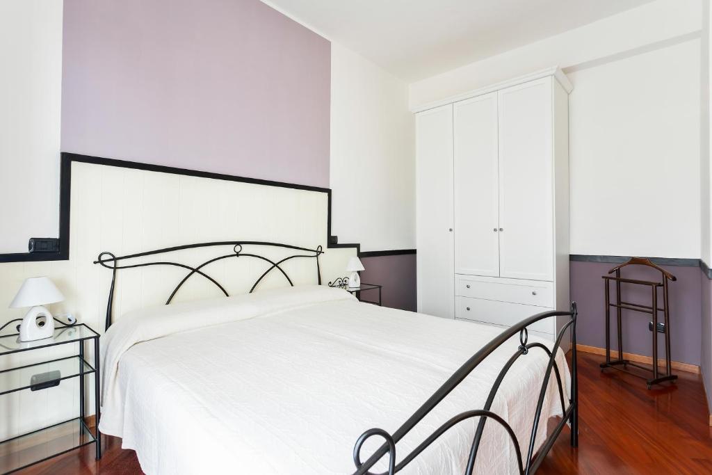 Posteľ alebo postele v izbe v ubytovaní Santa Chiara Apartment by MyHomeInComo