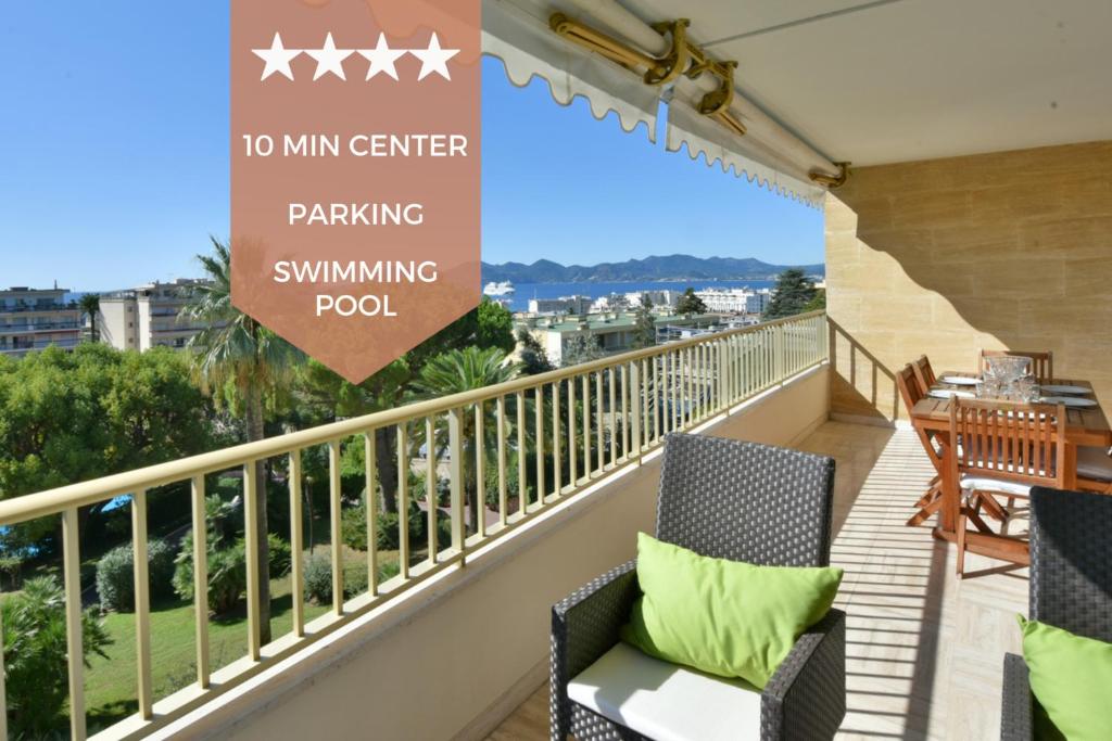 a balcony with a no swim center parking swimming pool at Close to downtown Cannes swimming pool and sea view in Cannes