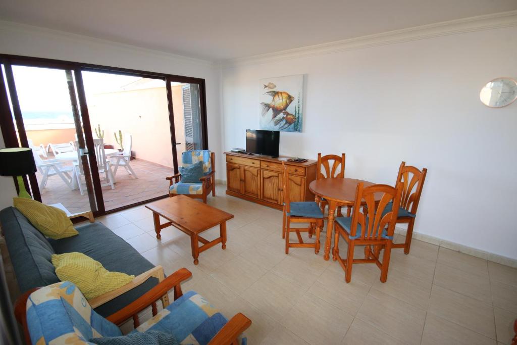 Posezení v ubytování SOTA 3 by RENTMEDANO Beach front, spectacular ocean views, parking, WiFi