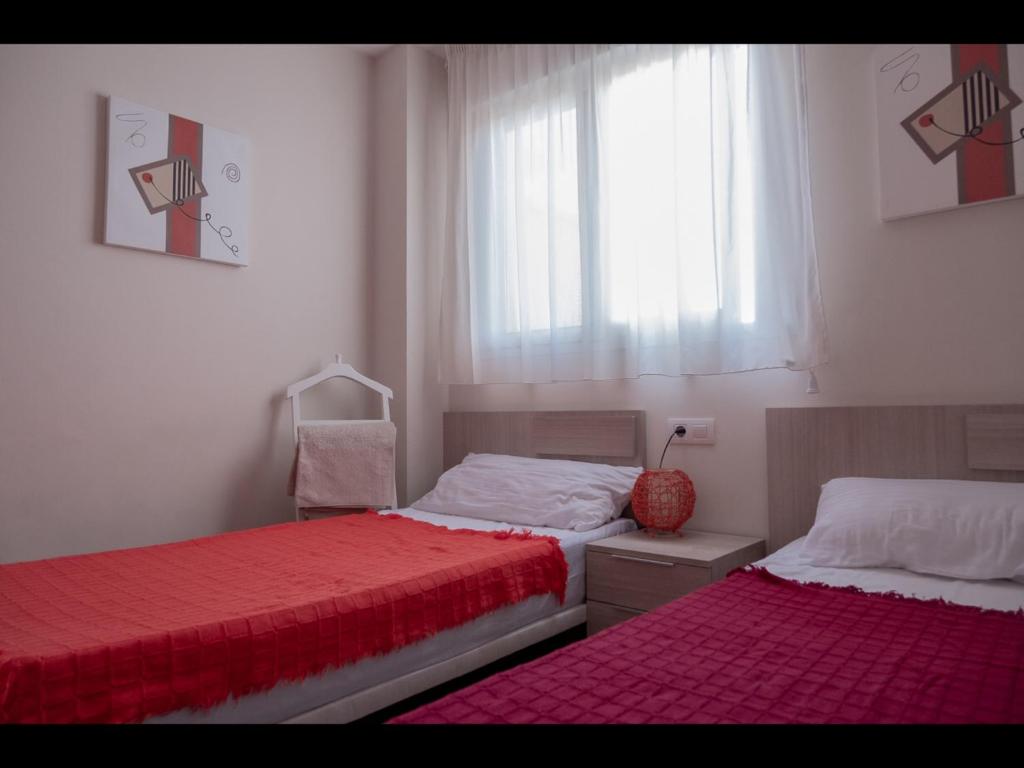 Posteľ alebo postele v izbe v ubytovaní Apartment Playa Sol 2