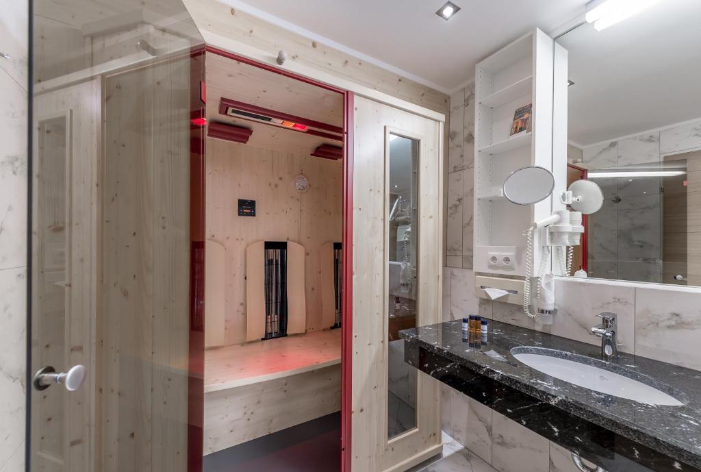 Koupelna v ubytování Hotel Enzian Hochsölden Superior