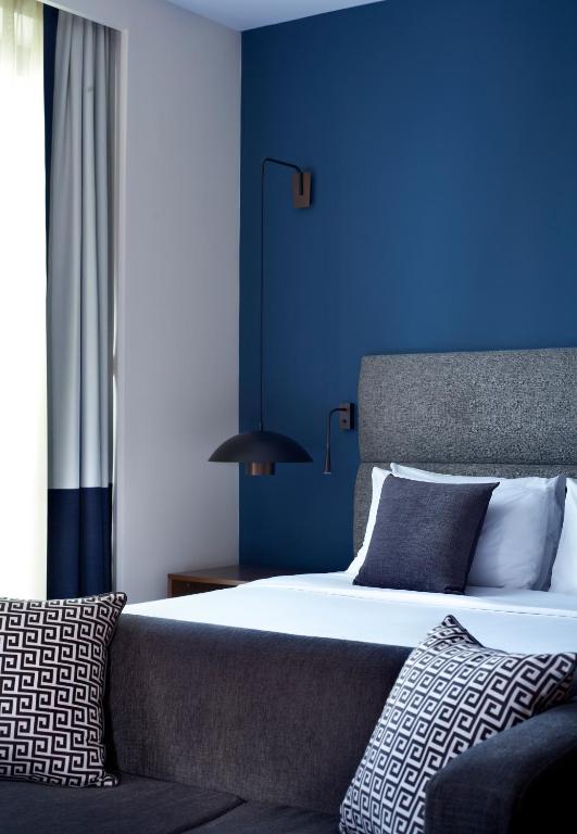 Letto o letti in una camera di Metropol Palace, Belgrade