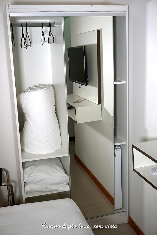 Postel nebo postele na pokoji v ubytování Pousada Molhes da Barra