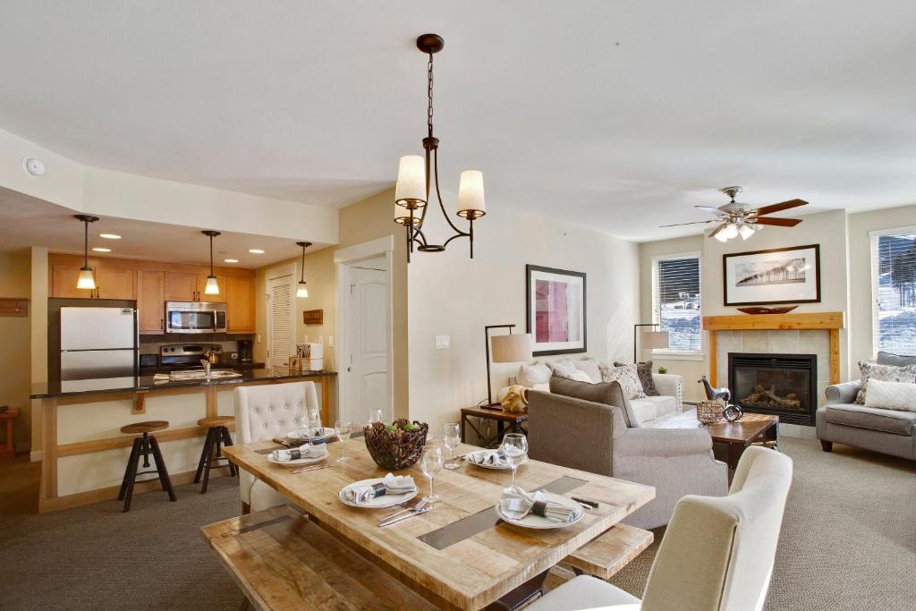 a dining room and living room with a table and chairs at Ski In-Out Luxury Condo #4474 With Huge Hot Tub & Great Views - 500 Dollars Of FREE Activities & Equipment Rentals Daily in Winter Park