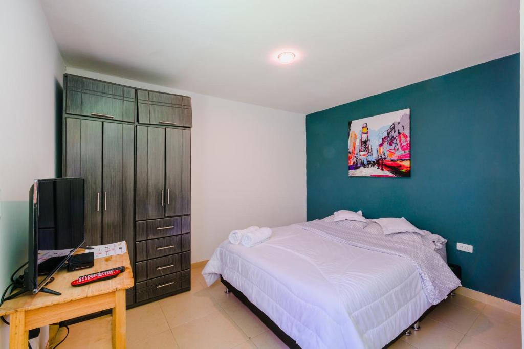 Postel nebo postele na pokoji v ubytování Hostal Doña Eliza