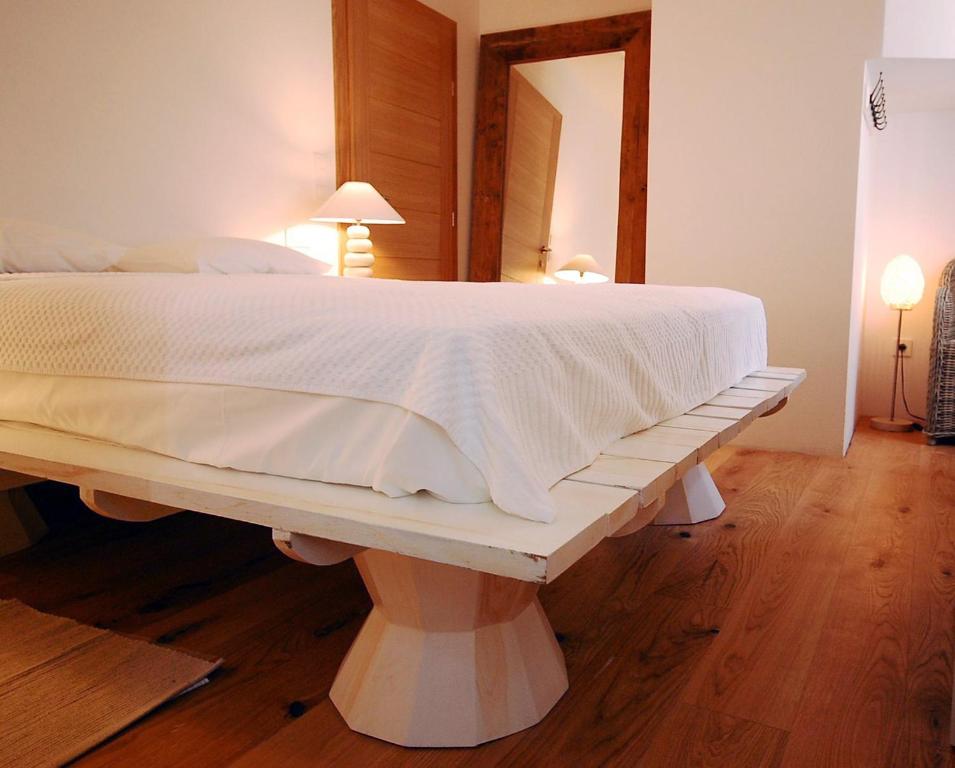 Łóżko lub łóżka w pokoju w obiekcie Boutique Hotel Placa